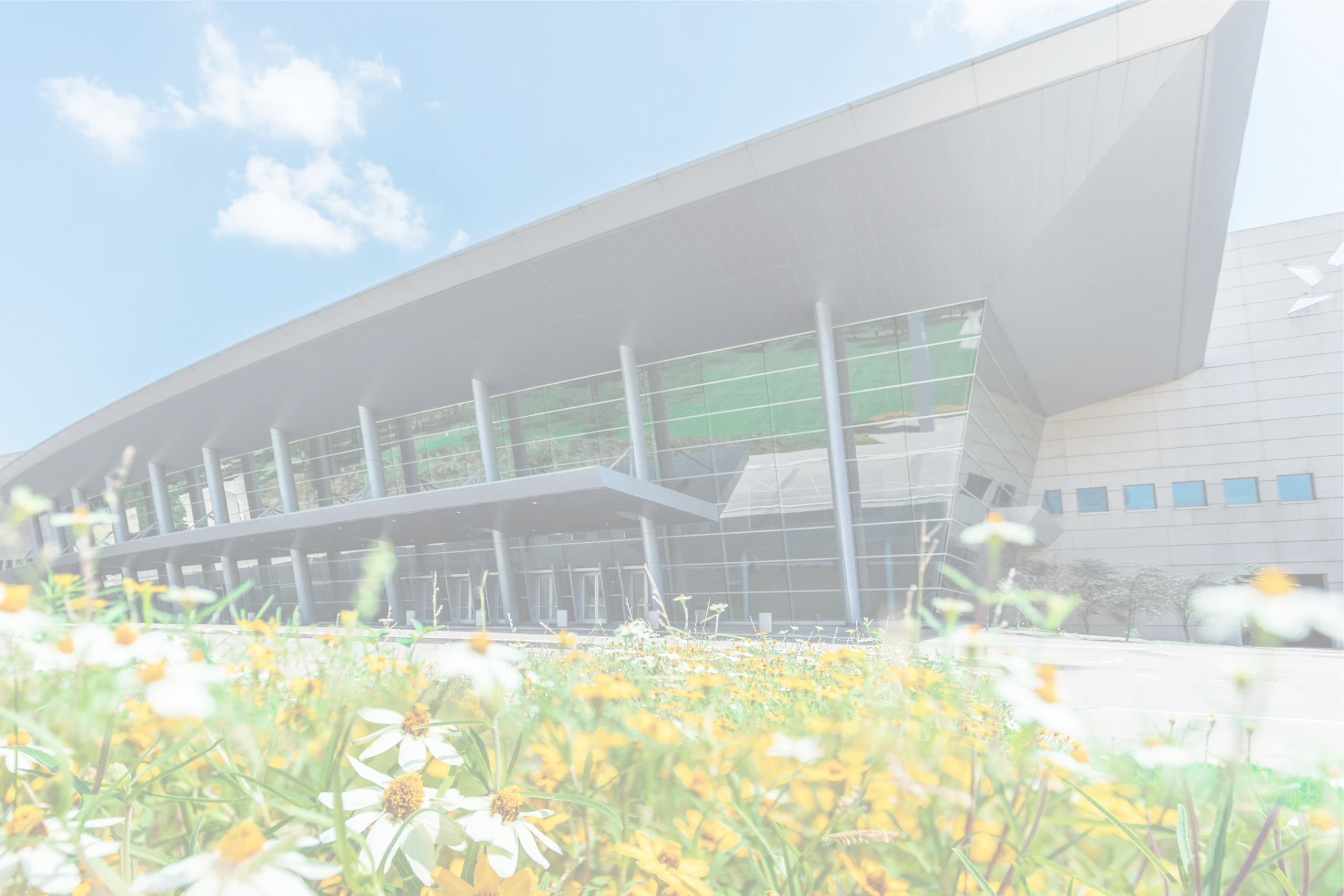 Kay Bailey Hutchison Convention Center Dallas exterior with distinctive roofline, where Smart City Networks provides technology and connectivity services.
