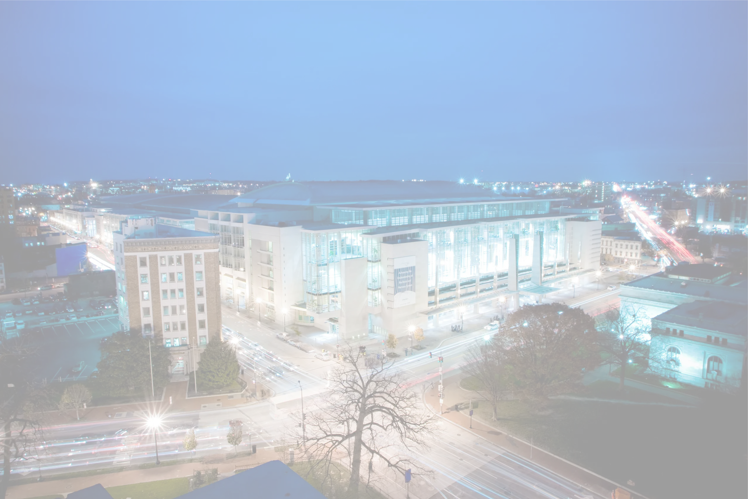Walter E. Washington Convention Center exterior lit at night, supported by Smart City Networks for technology and connectivity services.